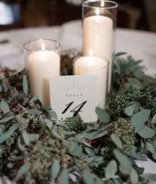 IMAGE 10 - Candles with greenery